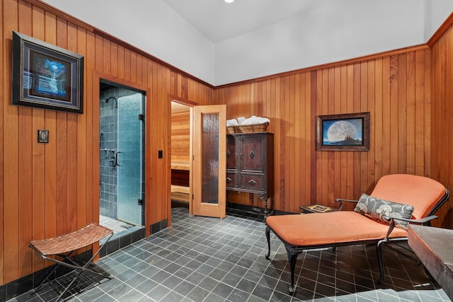 sitting room with wood walls