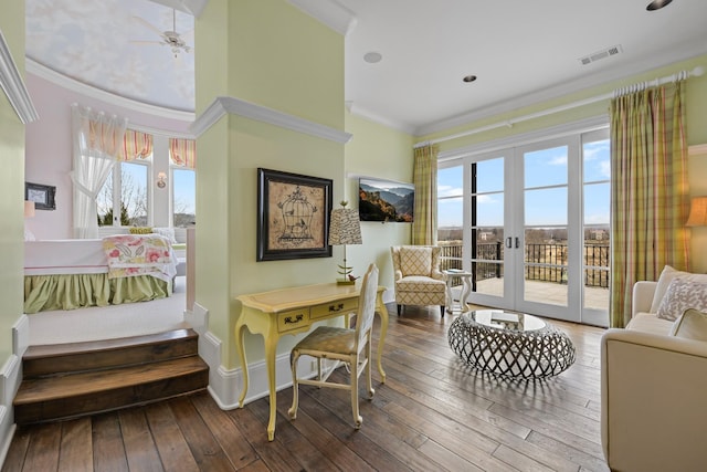 bedroom featuring crown molding, access to exterior, french doors, and hardwood / wood-style flooring