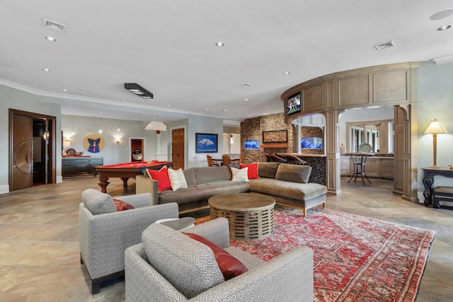 living room with pool table and ornamental molding