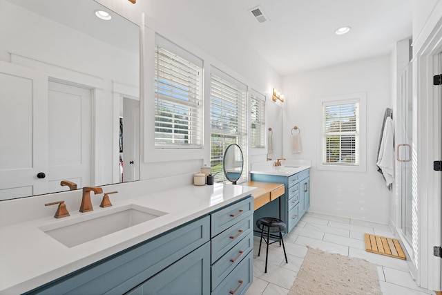 bathroom with vanity and tile patterned floors