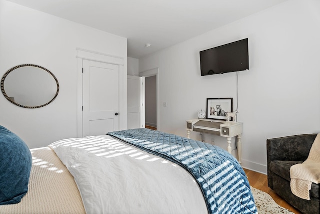 bedroom featuring hardwood / wood-style flooring