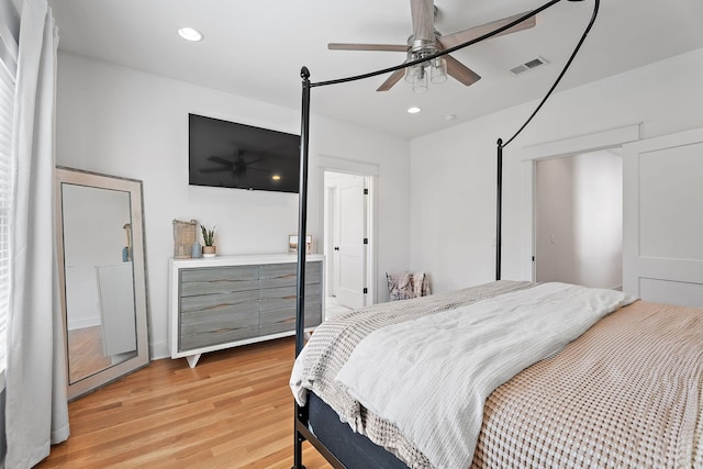 bedroom featuring ceiling fan and light hardwood / wood-style flooring