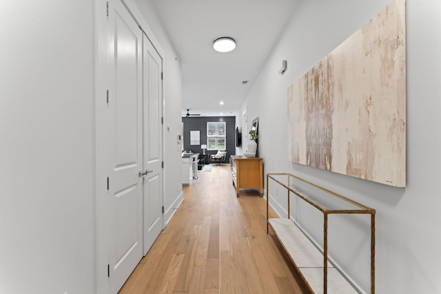 hallway featuring light hardwood / wood-style flooring