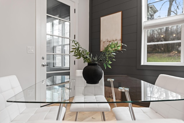 dining room featuring hardwood / wood-style flooring and a wealth of natural light