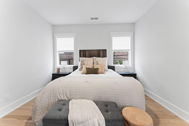 bedroom with light hardwood / wood-style floors