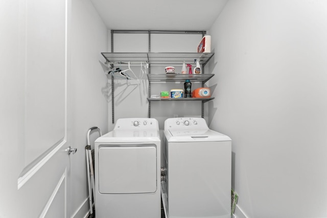 laundry room with washer and dryer