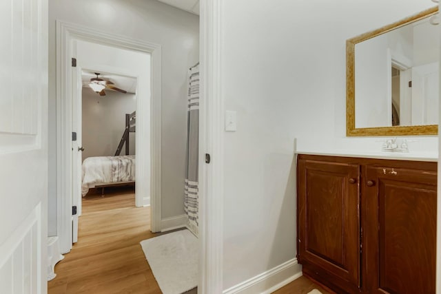 bathroom featuring vanity and wood-type flooring