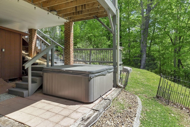 view of patio with a hot tub