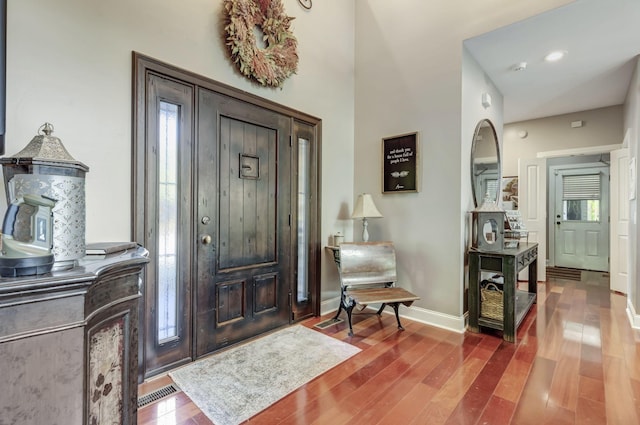 foyer entrance featuring hardwood / wood-style floors