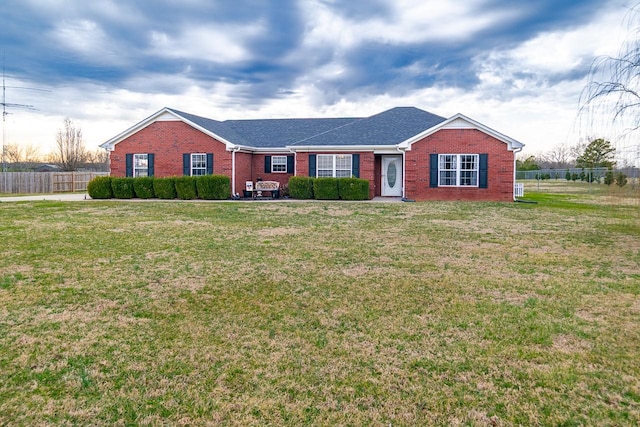 single story home featuring a front yard