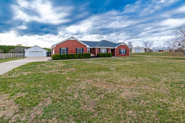 ranch-style home featuring a front yard and a garage