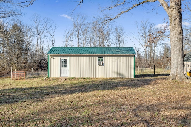 view of outdoor structure featuring a yard