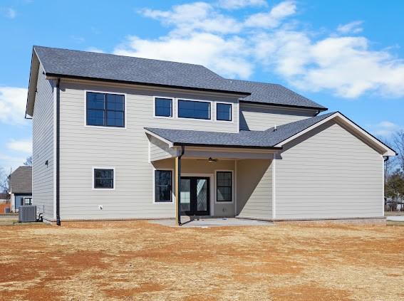 rear view of house with a patio area, cooling unit, and a ceiling fan