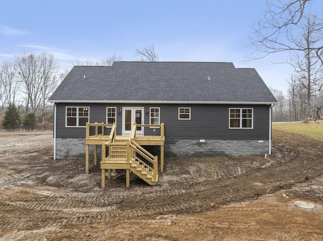 rear view of property with a deck