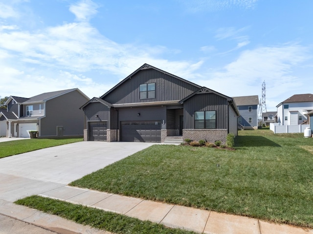 view of front facade with a garage and a front lawn