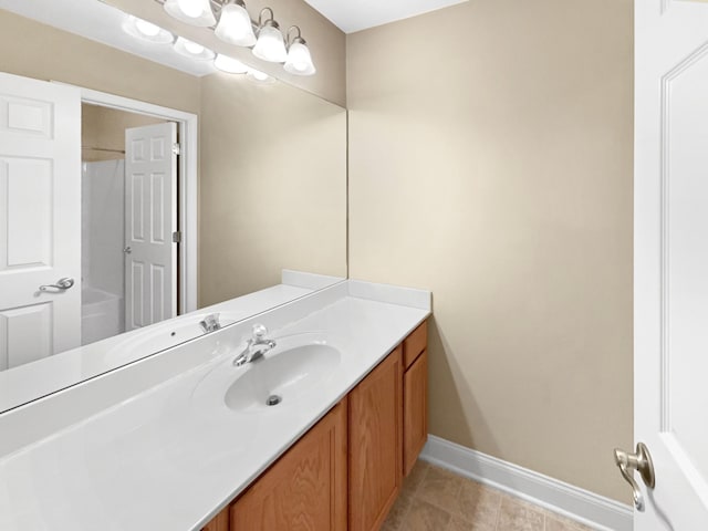 bathroom featuring vanity and tile patterned flooring