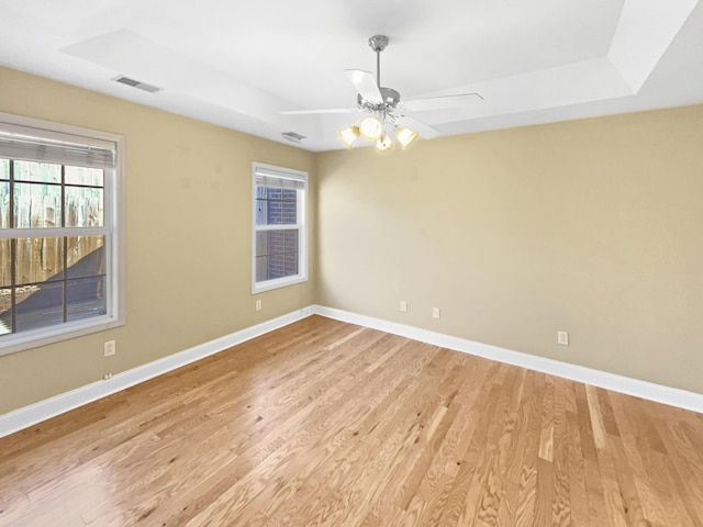 unfurnished room featuring ceiling fan and light wood-type flooring