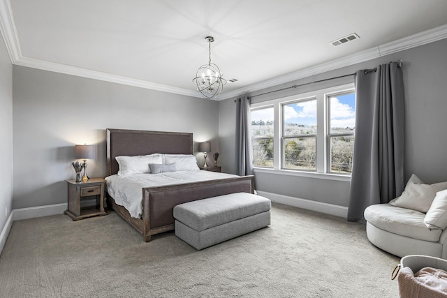 carpeted bedroom with ornamental molding and a chandelier