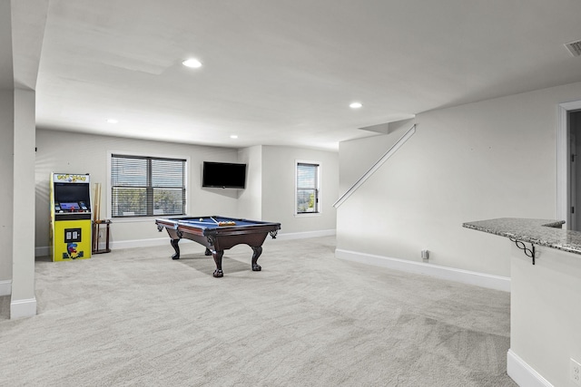 rec room with light colored carpet and billiards