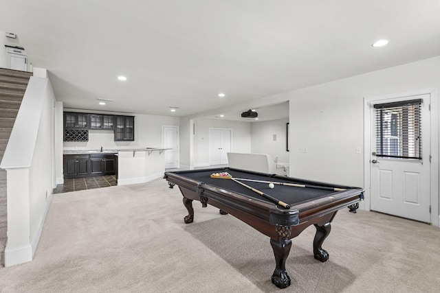 recreation room with billiards, dark carpet, and wet bar