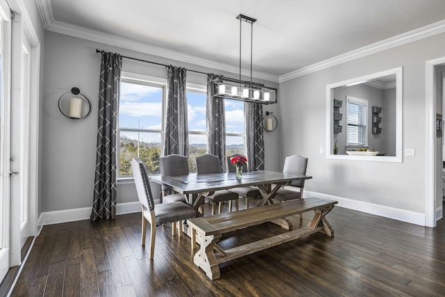 dining room featuring crown molding and dark hardwood / wood-style floors