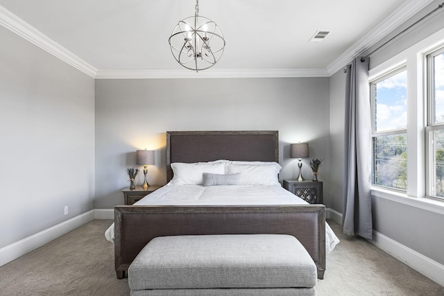 carpeted bedroom with ornamental molding and an inviting chandelier