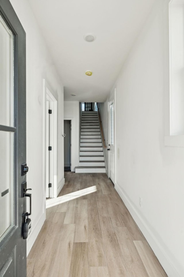 corridor featuring light wood-type flooring