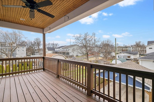 wooden terrace with ceiling fan