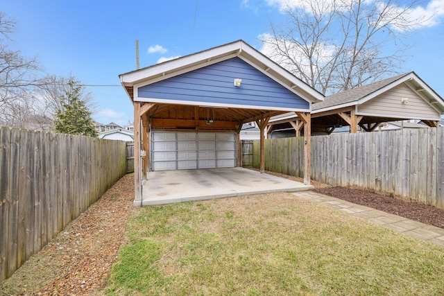 garage featuring a yard