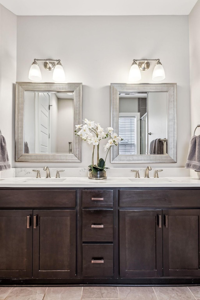 bathroom featuring vanity and walk in shower