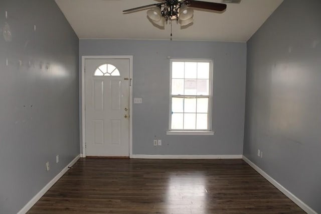 foyer entrance featuring dark wood-type flooring and ceiling fan