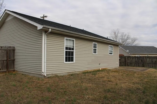 view of home's exterior featuring a yard