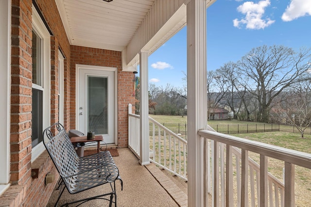 balcony featuring a porch