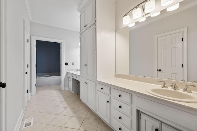 bathroom with tile patterned flooring, vanity, and ornamental molding