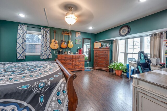 bedroom featuring dark hardwood / wood-style flooring