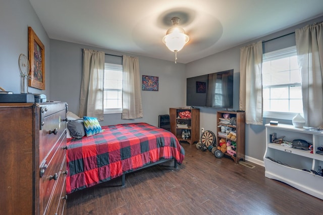 bedroom featuring hardwood / wood-style flooring