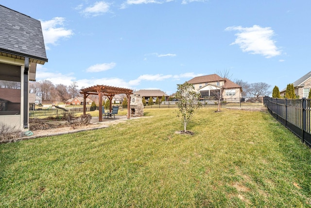 view of yard with a pergola and a patio