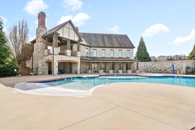 view of pool featuring a patio