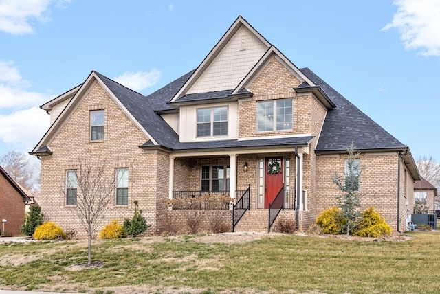 craftsman-style house with a front yard and a porch