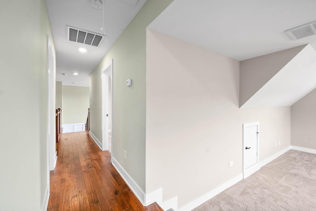 hallway with wood-type flooring