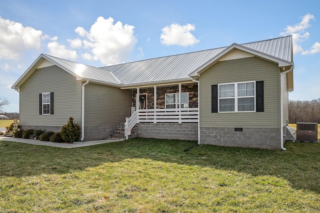 single story home featuring covered porch and a front lawn