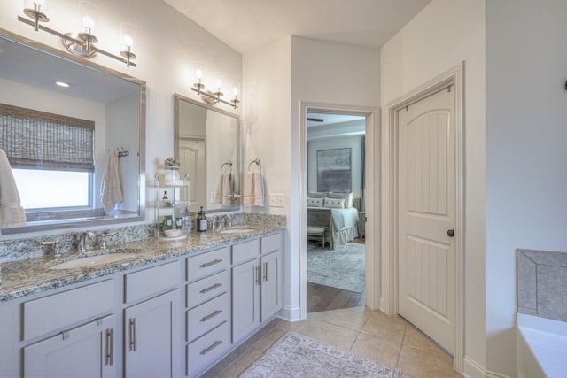 bathroom featuring vanity and tile patterned flooring