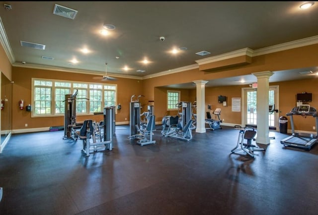 exercise room featuring decorative columns, ornamental molding, and ceiling fan