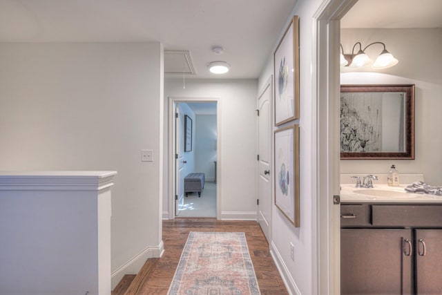 bathroom with wood-type flooring and vanity