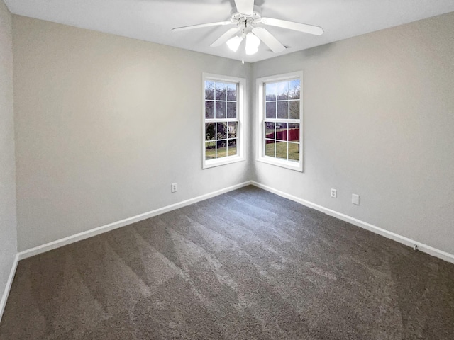 unfurnished room featuring ceiling fan and carpet