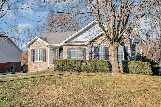 view of front of property with a front lawn