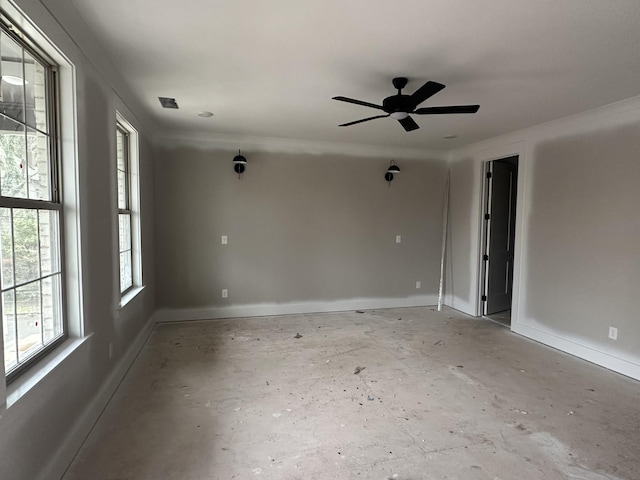 empty room featuring ceiling fan