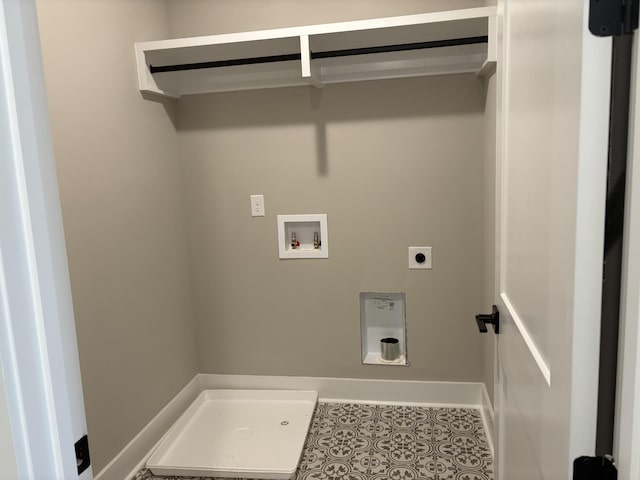 laundry room with laundry area, baseboards, hookup for a washing machine, tile patterned flooring, and electric dryer hookup