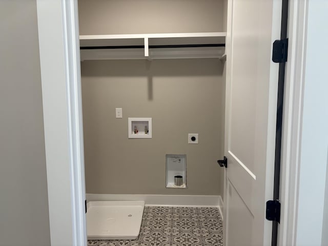 clothes washing area featuring baseboards, tile patterned flooring, hookup for a washing machine, and hookup for an electric dryer