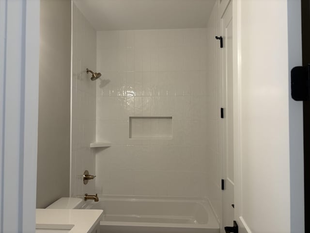 full bath with toilet, vanity, and bathing tub / shower combination